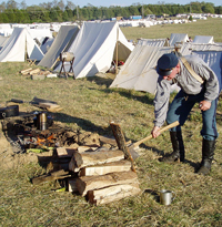 Sgt. Farr splitting wood