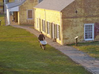 a man with a wheelbarrow