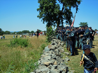 Lined up along the stone wall