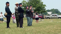 The bugler sounds for the Battalion to assemble