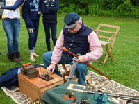 tests out his telegraph kit for the first time