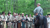 The Colonel thanks the tired men