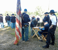 Sgt. Kent signing for his script