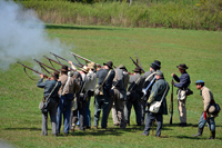 The Confederates firing