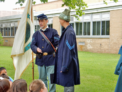 a frock coat and knit cap