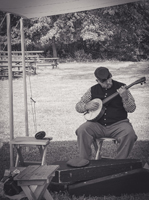 taking his turn at the banjo