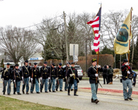 Marching along Mill Road