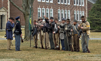 The Rebels inspecting arms